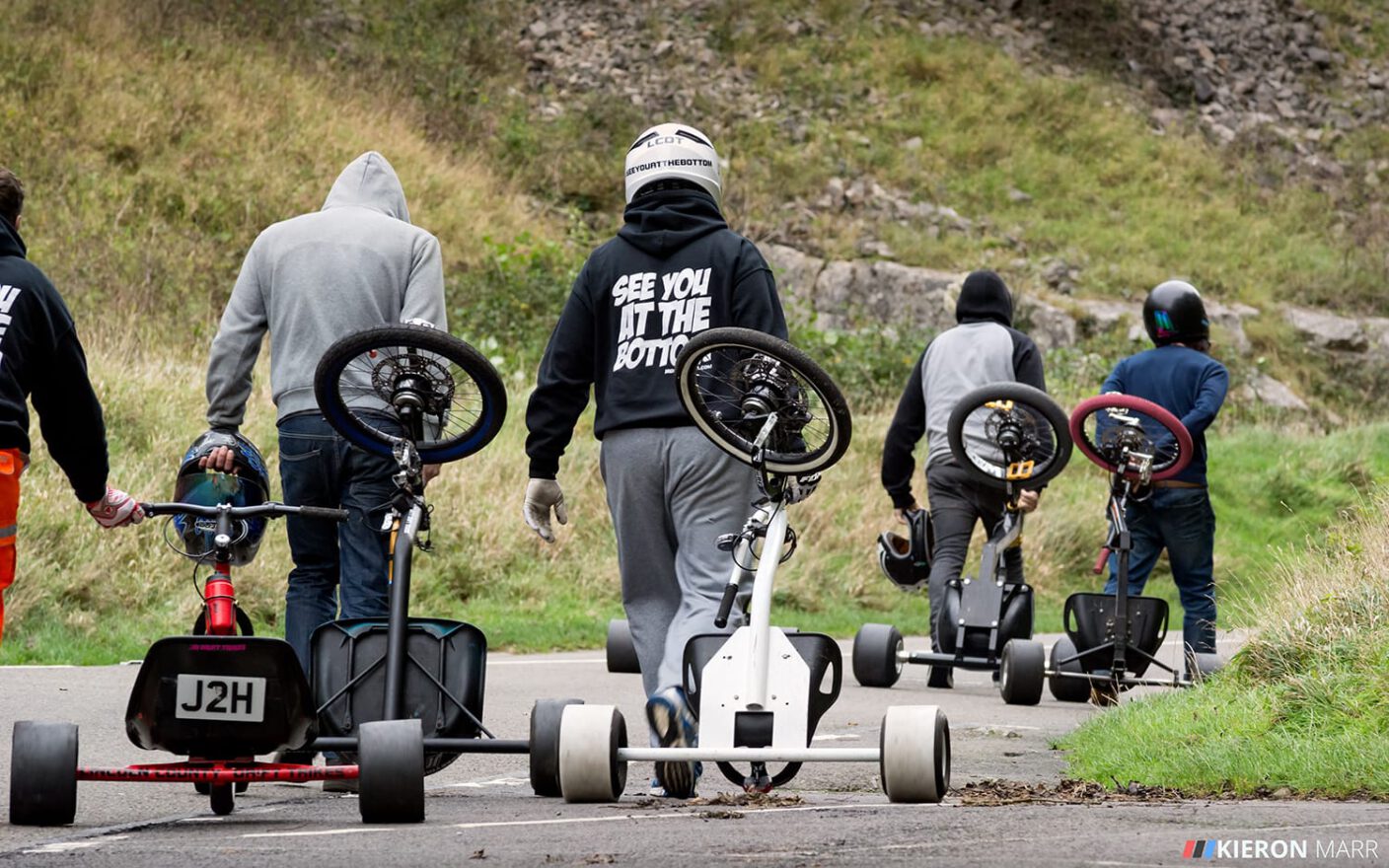 Riders and trikes starting the walk to the top of Cheddar Gorge